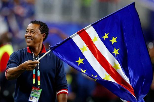 Cape Verde coach Pedro Brito celebrates after the match as Cape Verde qualify for the knockout stages of the World Cup